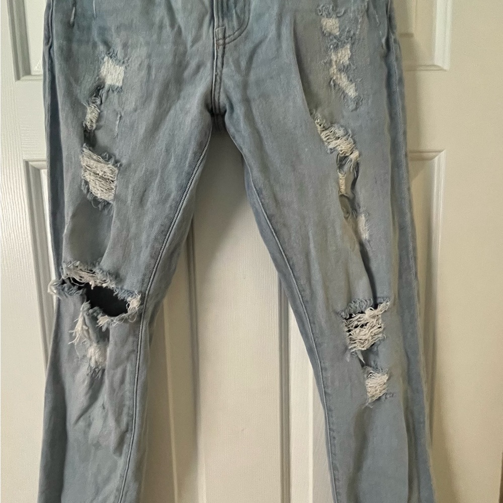 H & M Skinny Coupe Ripped Jeans. This jean has great white washed and distressed